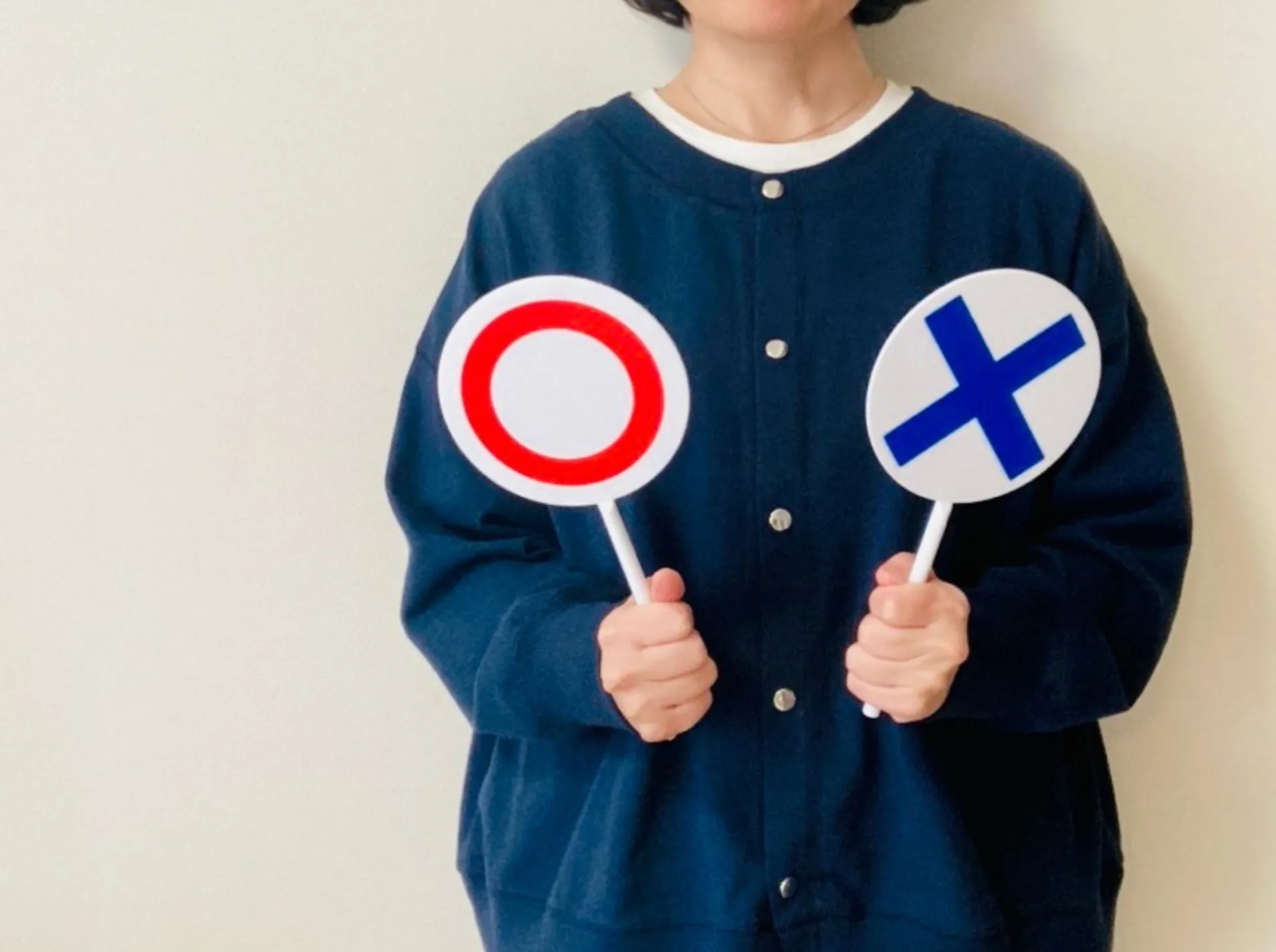 マルとバツを持つ女性